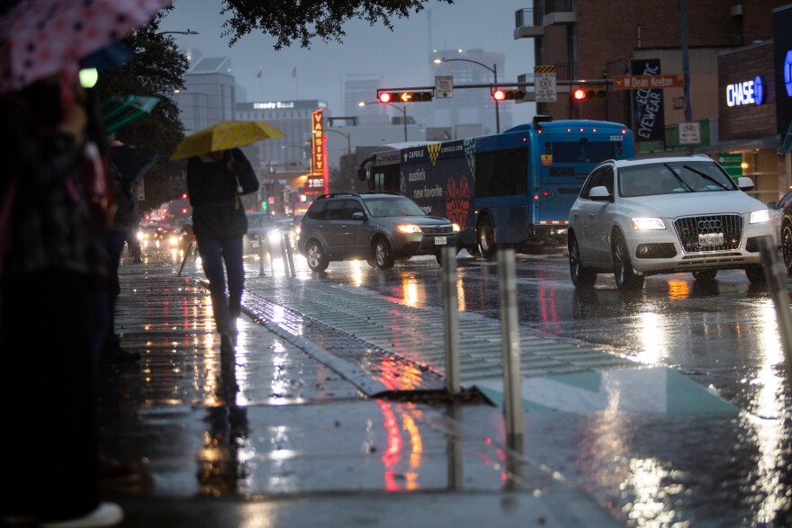 Rainy Downtown Street - Austin weather impact