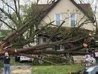 Storm damage in Mayville WI shows debris and destroyed structures after the tornado