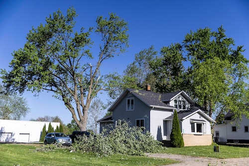 Storm aftermath and power outage near me with downed trees