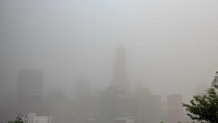 Downtown Chicago shrouded in a dust storm, with visibility near zero