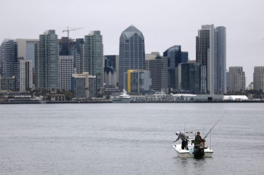San Diego skyline with clouds over the bay, illustrating typical San Diego weather conditions