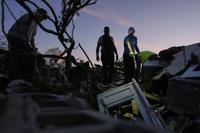 Damaged homes and debris after the tornado in Fayetteville, AR